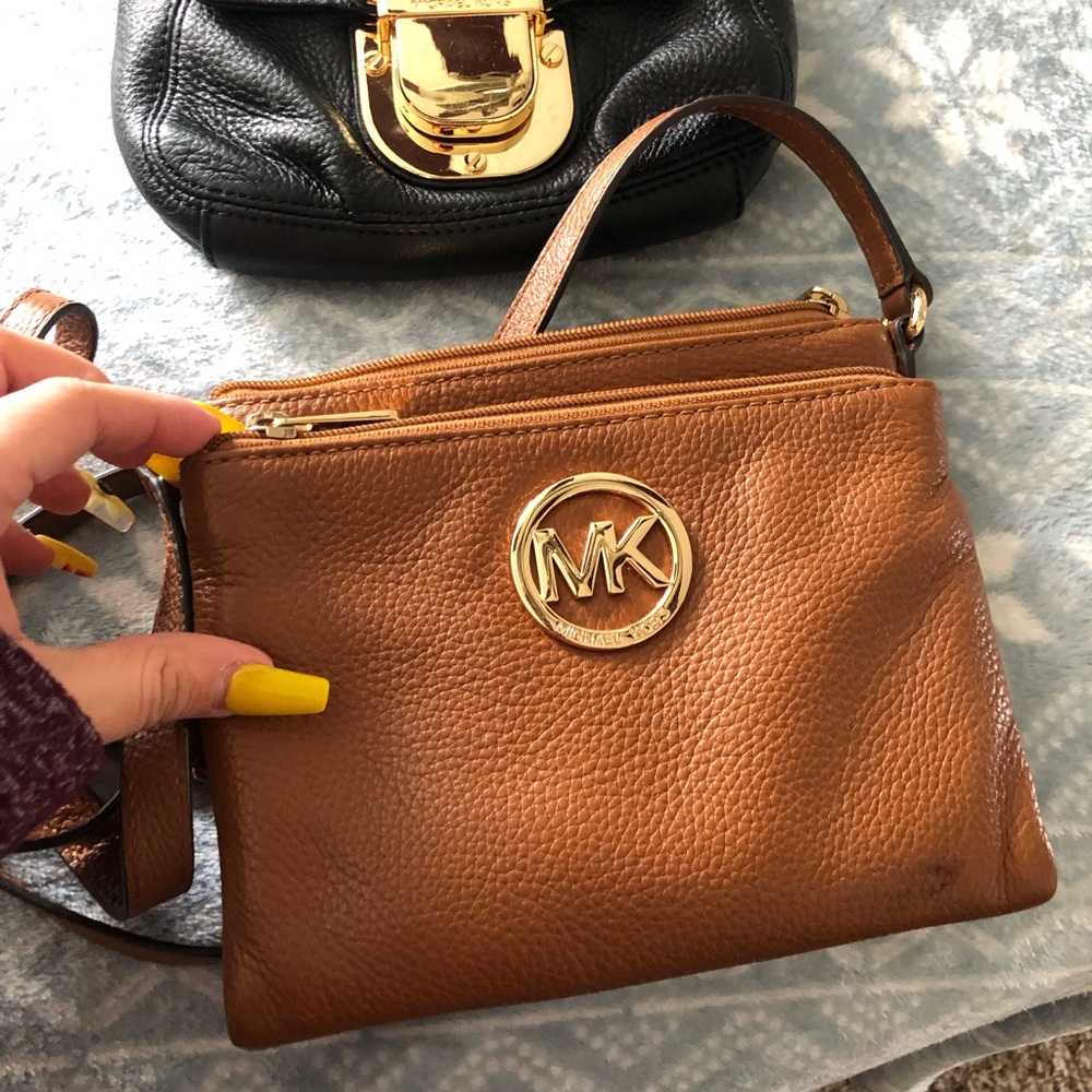 Michael Kors never used.
